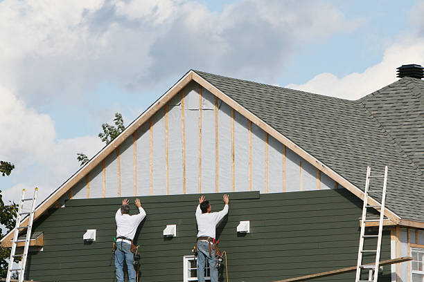 Professional Siding Repair technician working in Bruington, VA